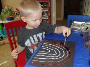 Making rainbows for St. Patrick's Day with salt painting