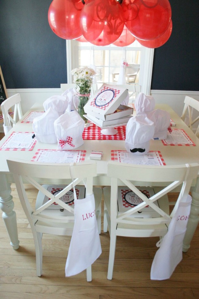 Pizza party table decorations, chef hats and aprons